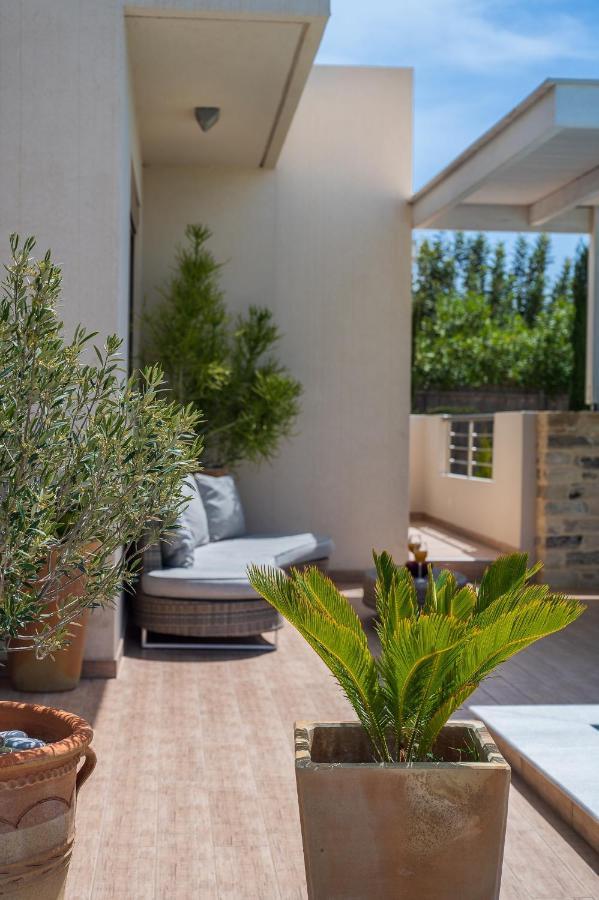 Golden Sky Villa กามิลารี ภายนอก รูปภาพ